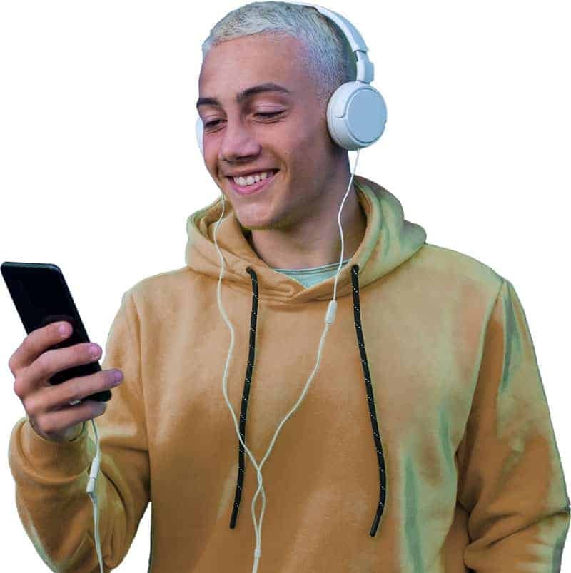 person-headphones-smiling-phone A person with headphones smiling at a phone
