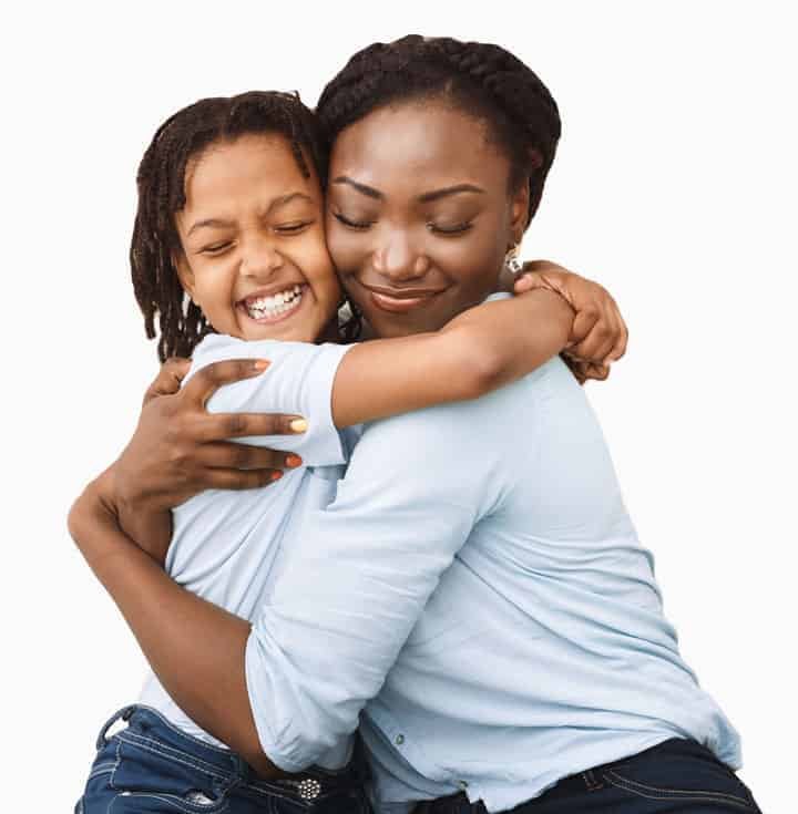 woman-hugging-smiling-child a woman hugging a smiling child File name: woman-hugging-smiling-child